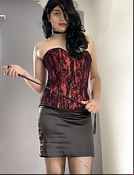 Tranny tart is revealing her breasts