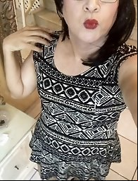 Alluring transgender beauty EmmaNataly in seductive poses